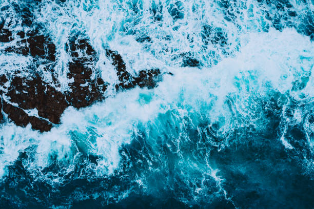 Powerful sea waves from above Powerful sea waves from above rocky coastline stock pictures, royalty-free photos & images