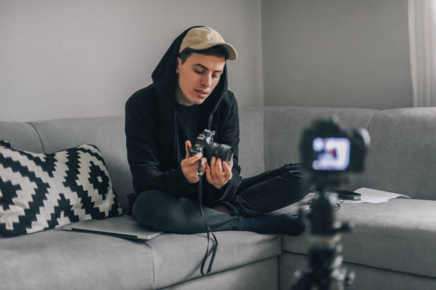 istock Young photographer making a video blog 1272372402