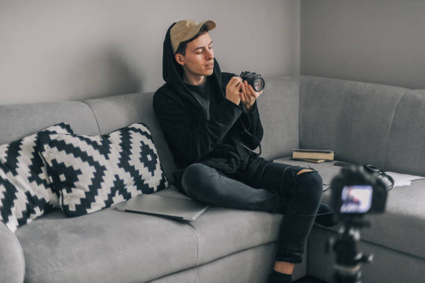 istock Young photographer making a video blog 1272372438