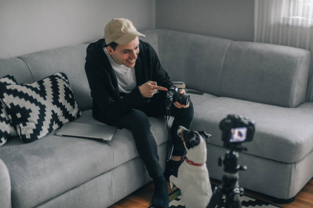 istock Young photographer making a video blog 1272372444