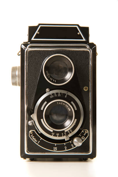 istock Old antique black photo camera on a white background 1272372506
