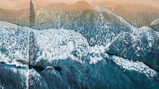 istock Waves and sea in summer, aerial view 1272373476