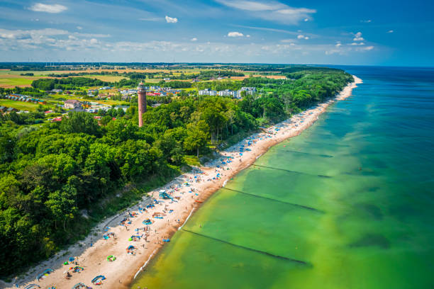 Beach with people in Baltic Sea, aerial view, Poland Beach with people in Baltic Sea, aerial view, Poland, Europe baltic sea people stock pictures, royalty-free photos & images