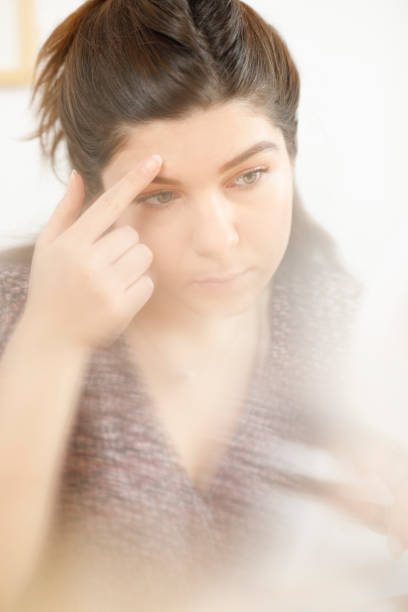 istock Female student Morning makeup, preparation for  e-learning  working at home office, social distancing - quarantine. New normal, illness prevention. 1272378399