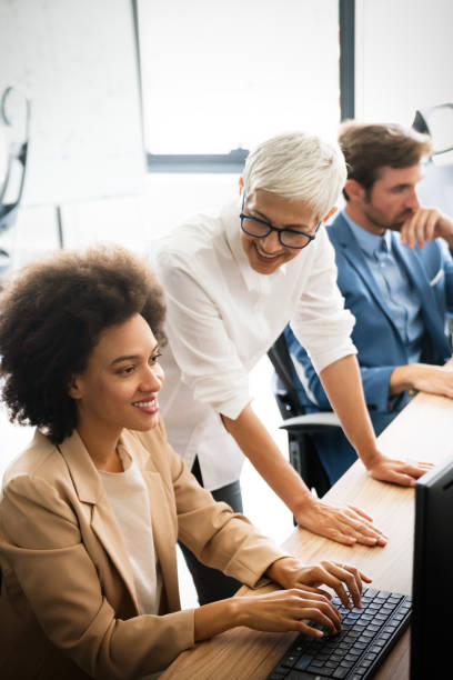 istock Collaboration and analysis by business people working in office 1272380255
