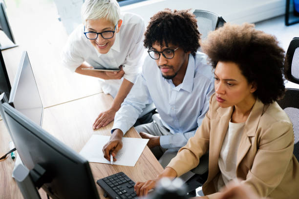 istock Collaboration and analysis by business people working in office 1272380435