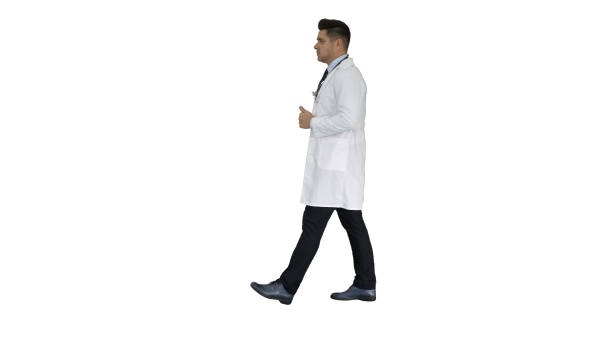 istock Walking male doctor passing by on white background 1272380571