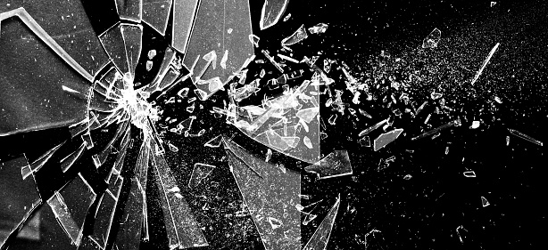 Broken glass on the black background. Texture of broken glass. Isolated realistic cracked glass effect. Template for design. 3D rendering