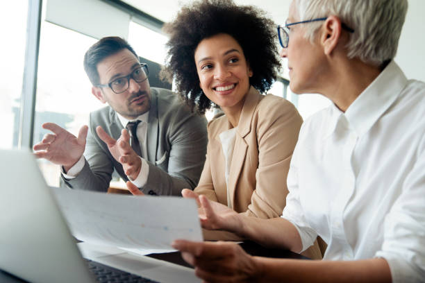 istock Collaboration and analysis by business people working in office 1272381535