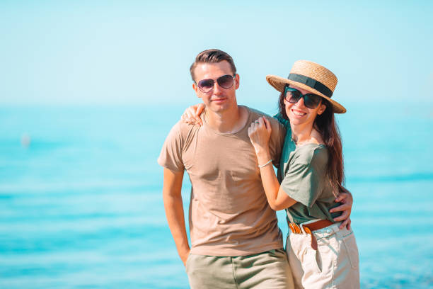 istock Young couple on white beach during summer vacation. 1272385970