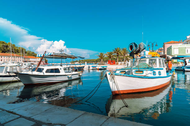 Boats on the pier in Jelsa town, Hvar, Croatia Boats on the pier in Jelsa town, Hvar, Croatia. jelsa stock pictures, royalty-free photos & images