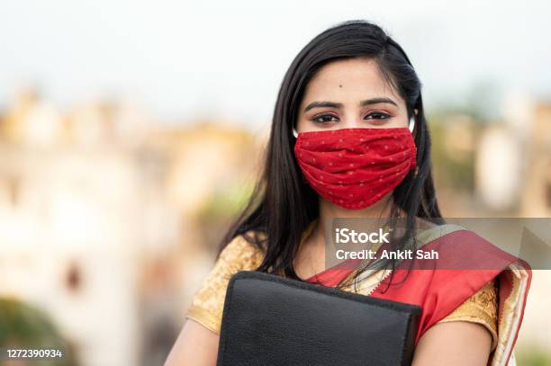 Portrait Of Young Asian Indian Businesswoman In Sari Stock Photo - Download Image Now