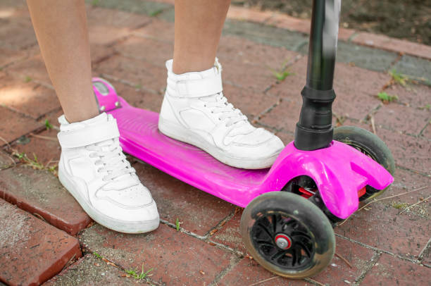 istock Little girl on the scooter 1272394644