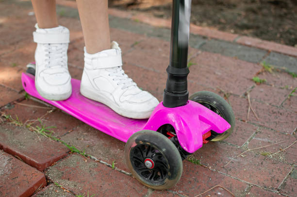 istock Little girl on the scooter 1272394821