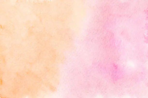 Hand painted soft orange and pink watercolor background. Abstract two tone watercolor wallpaper.