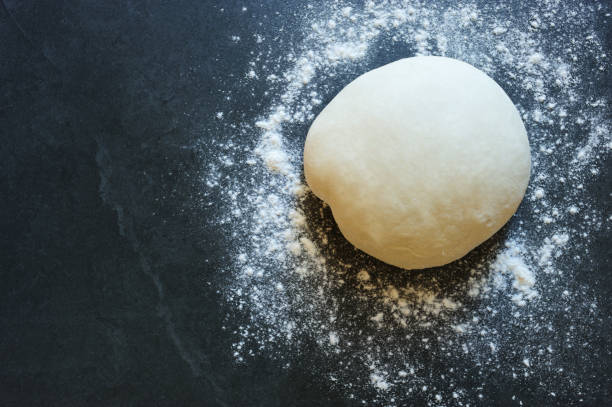 raw dough. homemade baking. - dough sphere kneading bread imagens e fotografias de stock