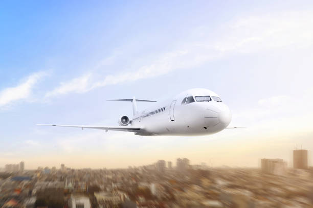 istock Airplane flying in the air 1272401518