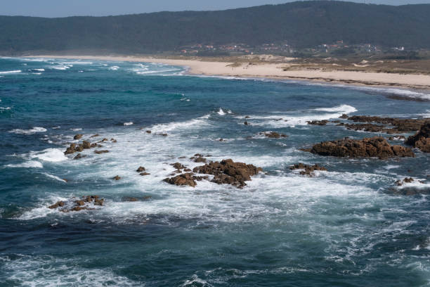 istock Coast cliff path to the lighthouses Traba beach in Laxe Galicia Spain 1272403613
