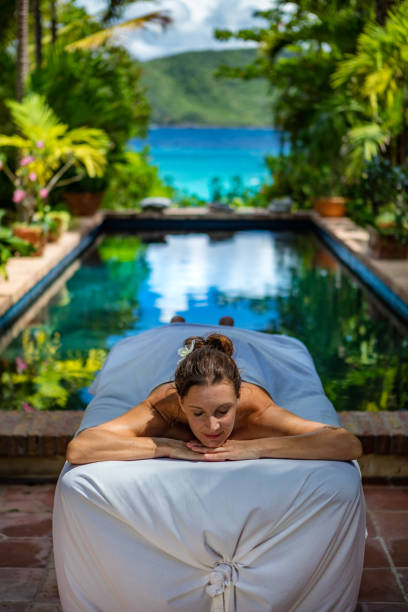 woman waiting for a massage at a beautiful villa in caribbean - tropical spa imagens e fotografias de stock