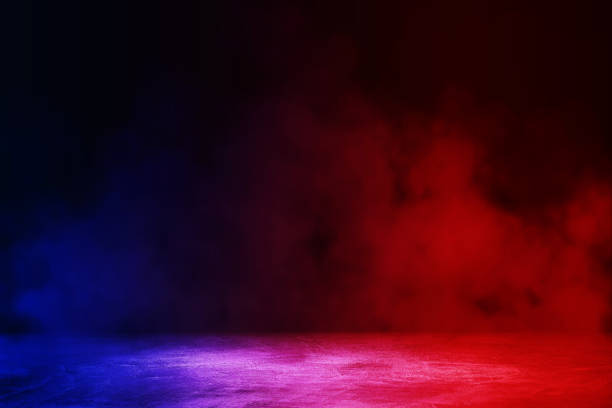 istock Studio dark room with lighting effect red and blue on concrete floor gradient background for product showing. 1272408093