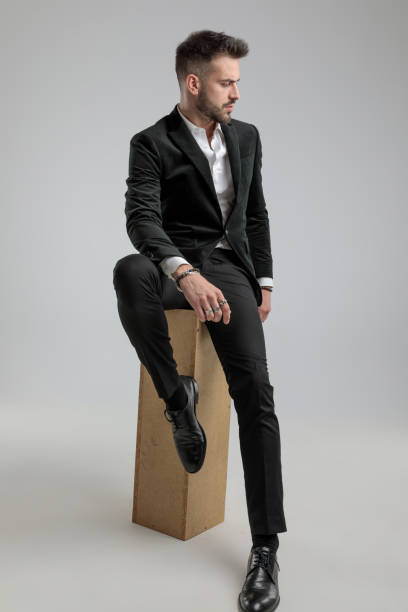 istock cool handsome businessman looking to a side 1272409786