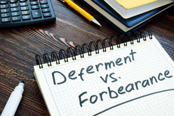 istock List of Deferment vs Forbearance for choosing in notepad. 1272410933