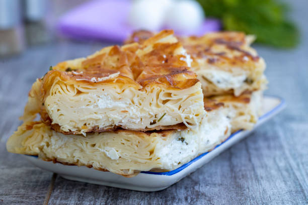istock Su Boregi / Turkish Patty on wooden surface. 1272412725