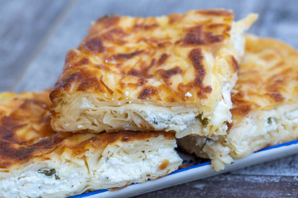 istock Su Boregi / Turkish Patty on wooden surface. 1272412726