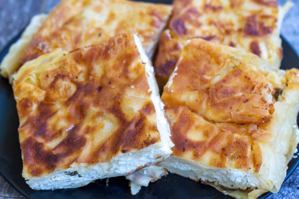 istock Su Boregi / Turkish Patty on wooden surface. 1272412727