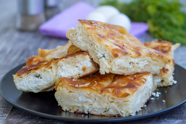 istock Su Boregi / Turkish Patty on wooden surface. 1272412935