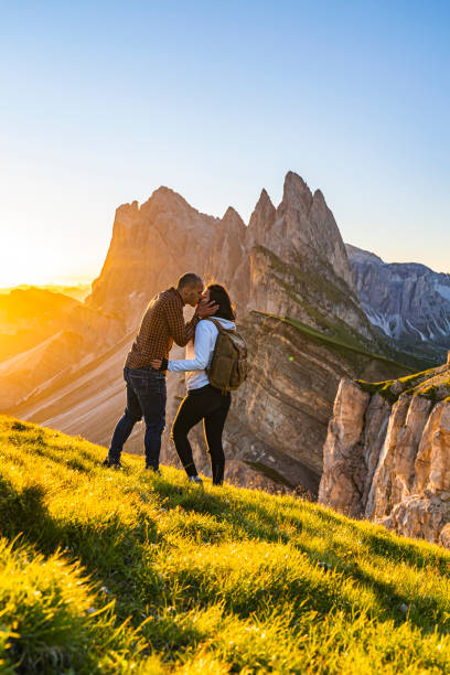 istock Young man kissing beautiful girlfriend 1272414043