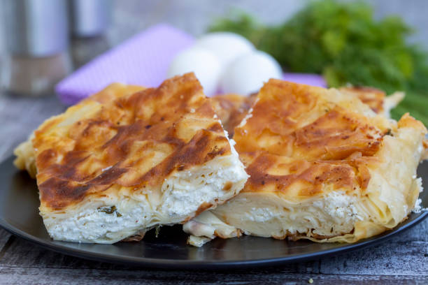 istock Su Boregi / Turkish Patty on wooden surface. 1272414295