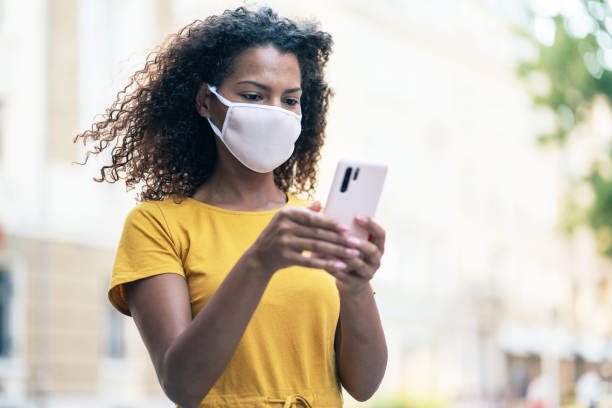 istock Woman with face protective mask 1272415656