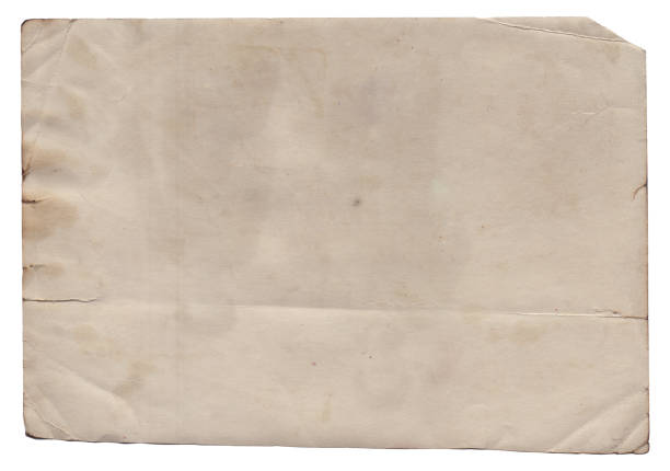 istock Old vintage texture retro paper with burned edges, stains and scratches background 1272416058