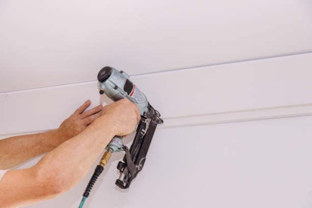 istock Installation of crown moldings trim on the ceiling 1272417072
