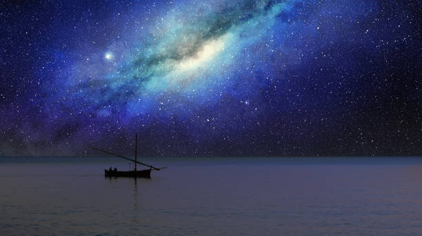 istock fishing boat sails under the milky way 1272417253