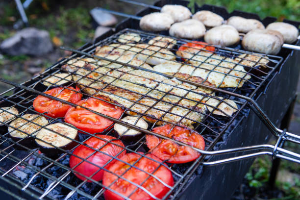 istock bbq concept fish on fire with mushroom and tomatoes 1272419983