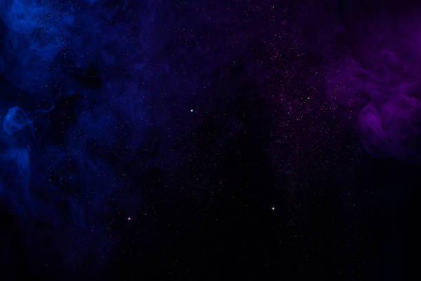 istock Smoke and shiny glitter abstract background 1272422572