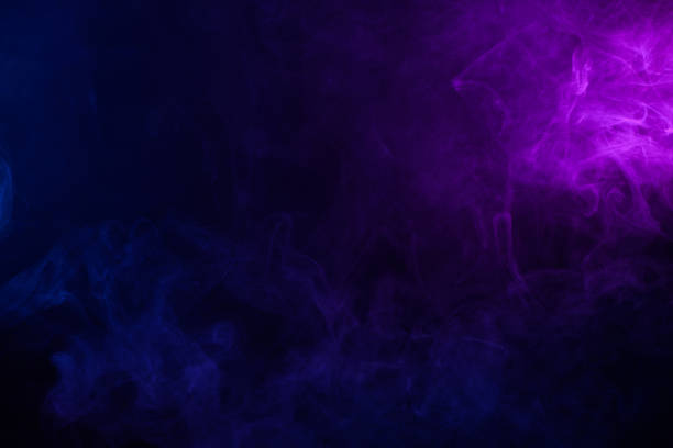 istock Soft clouds of smoke on dark background 1272422716