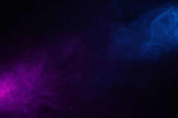 istock Two connecting colorful clouds smoke and shiny glitter 1272423125