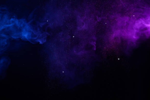 Blue and pink smoke with shiny glitter cosmos abstract background