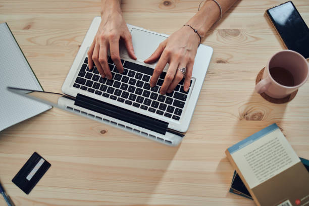 istock Woman working from home, using laptop / notebook, modern freelance concept. 1272428626