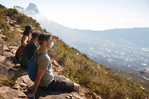 istock Friends resting on the mountain with dogs 1272438163