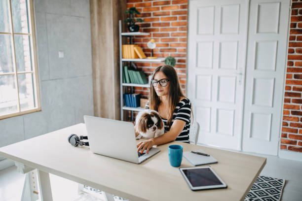 istock Young woman working at home 1272438650