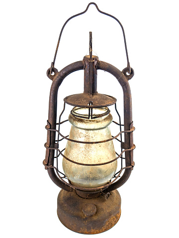 Old rusty kerosene lamp on a white background. Lighting equipment. Roofing lamp. Retro style. White background. Background image. Place for text.