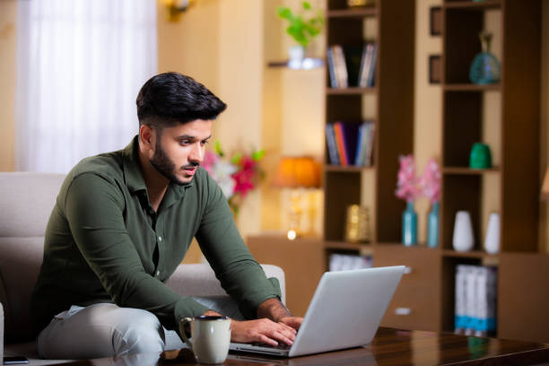 istock Young man at home - stock photo 1272441688