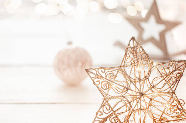 istock Festive new year background with a star and lights 1272441826