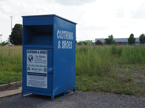 Luray, USA - June 6, 2019: A container for recycling shoes and clothing.