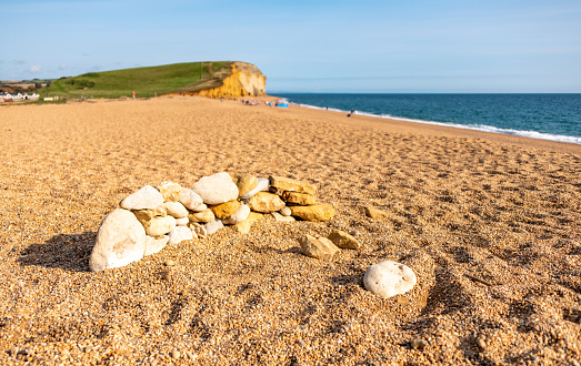 Pebbles on the beach at West Bay in Dorset on the Jurassic Coast