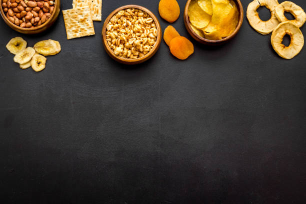 istock Variety of healthy snacks overhead on the table, copy space 1272447876